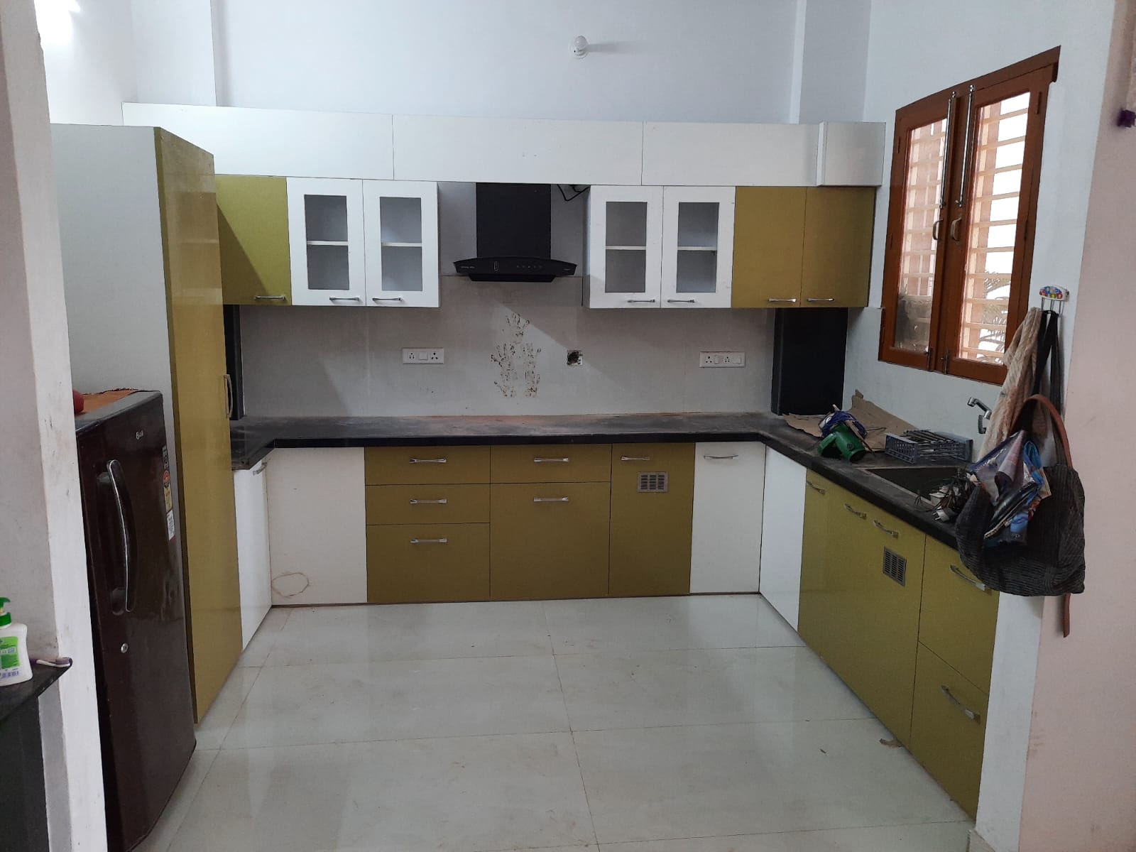 Olive green and white modular kitchen side view Bharatpur
